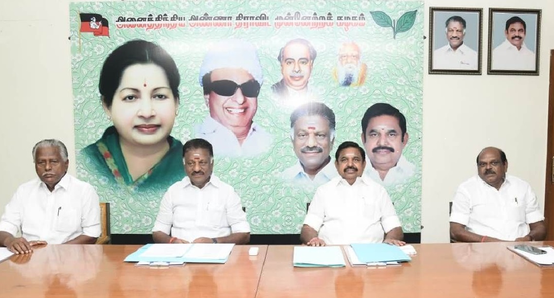 AIADMK leaders O Panneerselvam (second from left) and E Palaniswami (third from left) at a part meeting. (Twitter/AIADMKOfficial)