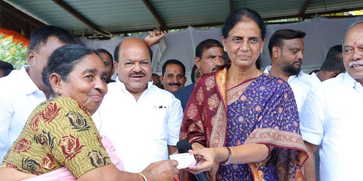 Telangana Education Minister Sabitha Indra Reddy distributing pensions to beneficiaries at Saroornagar in Hyderabad on Wednesday, 21 September. (South First)