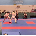 Karthik (on left) in action at the CKC in Birmingham. (Supplied)