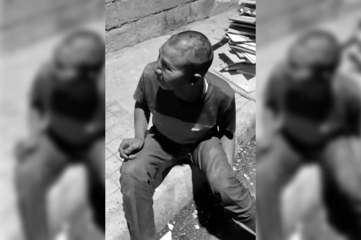 Screengrab of the video showing the victim Sanjay Tudu with a deep cut on his head and bleeding profusely.