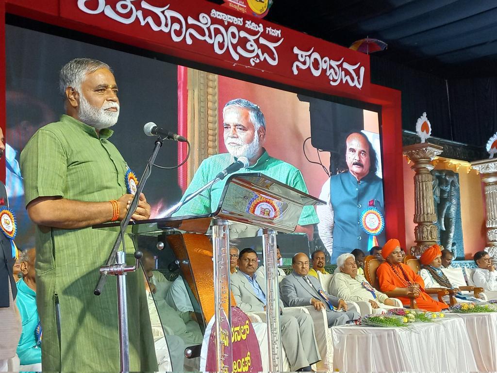 Minister for Primary and Secondary Education B C Nagesh addressing the gathering during the centenary celebrations of the ‘Vidya Dana Samiti Education Society in Gadag on Sunday. (Photo credits: Twitter/B C Nagesh)