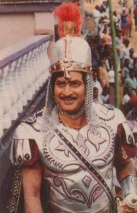 a still from simhasanam