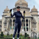 Indian skier Bhavani TN infront of the Karnataka State Legislature Vidhan Soudha.