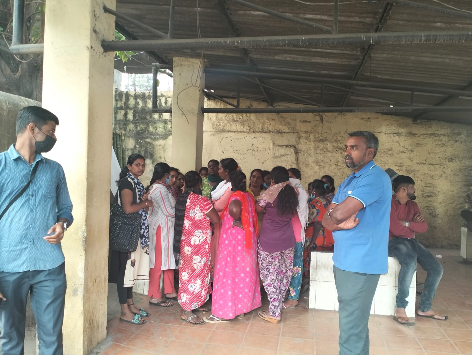 Vinod's friends and relatives waiting outside Victoria Hospital's Mortuary