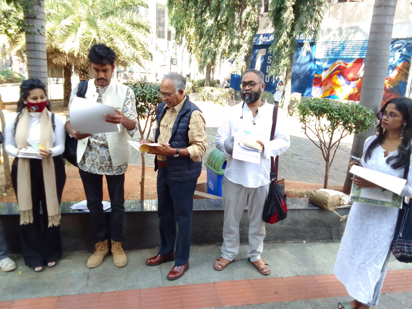 Volunteers from Bahutva Karnataka reading the Preamble and taking the pledge on Church Street. (Bellie Thomas/South First)