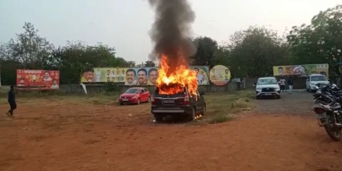 A car was set ablaze at the TDP office in Gannavaram in the Krishna district of Andhra Pradesh. (Supplied)