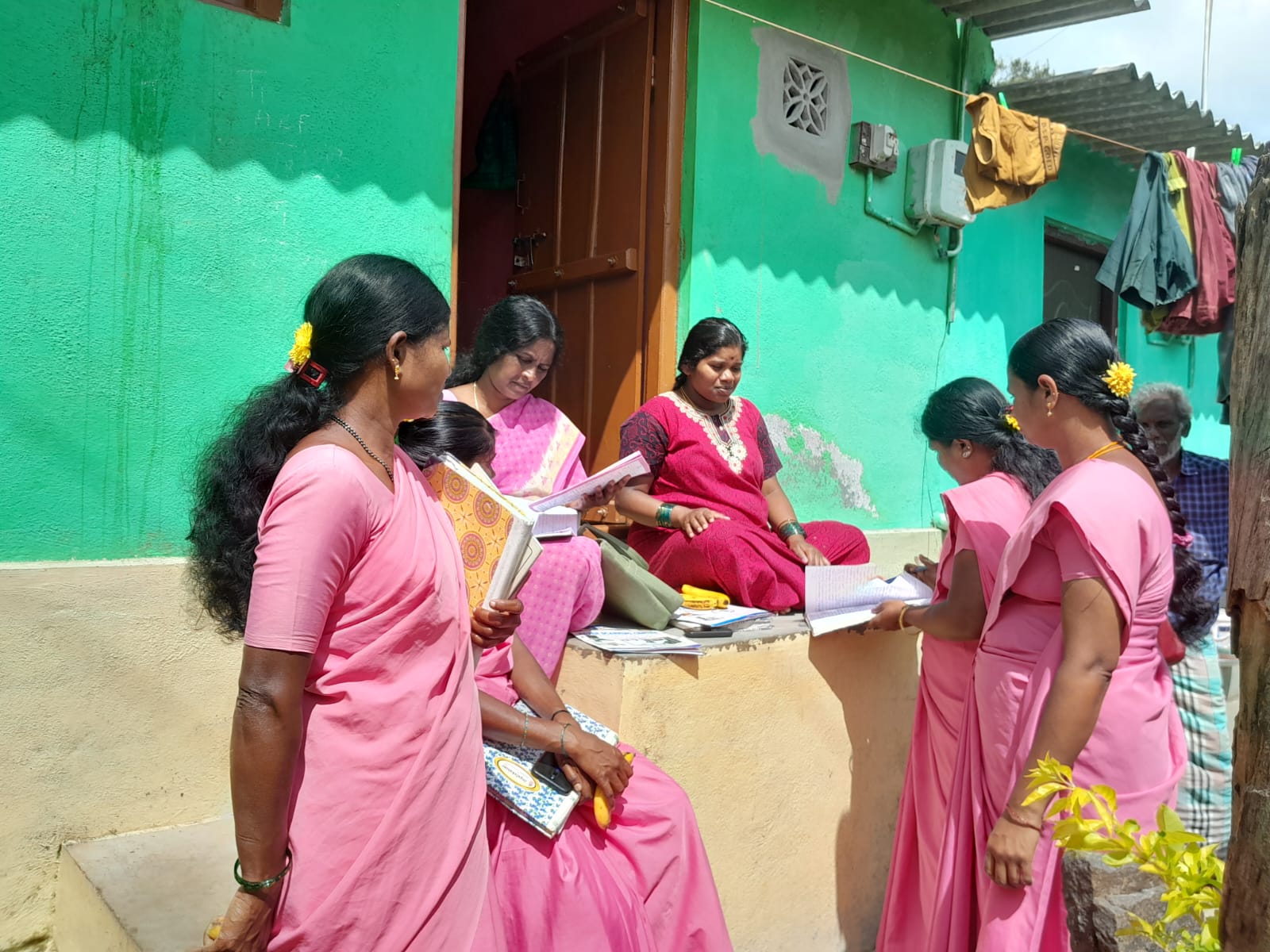 ASHAs interacting with pregnant women in BR Hills. Now, the Thayi Card will make note of mental health of pregnant women.