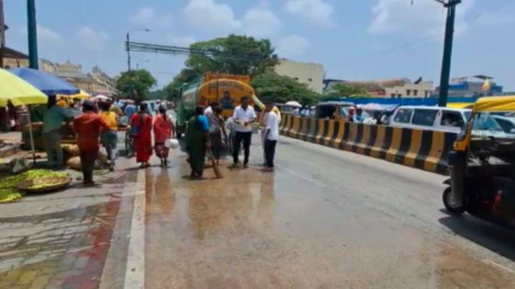 Stretch of Sayyaji Rao Road getting cleaned in Mysuru's KR Circle
