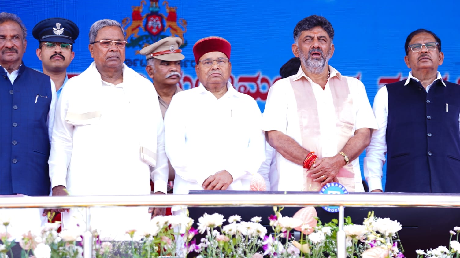 Governor of Karnataka Thaawarchand Gehlot with Siddaramaiah and DK Shivakumar. (Supplied)