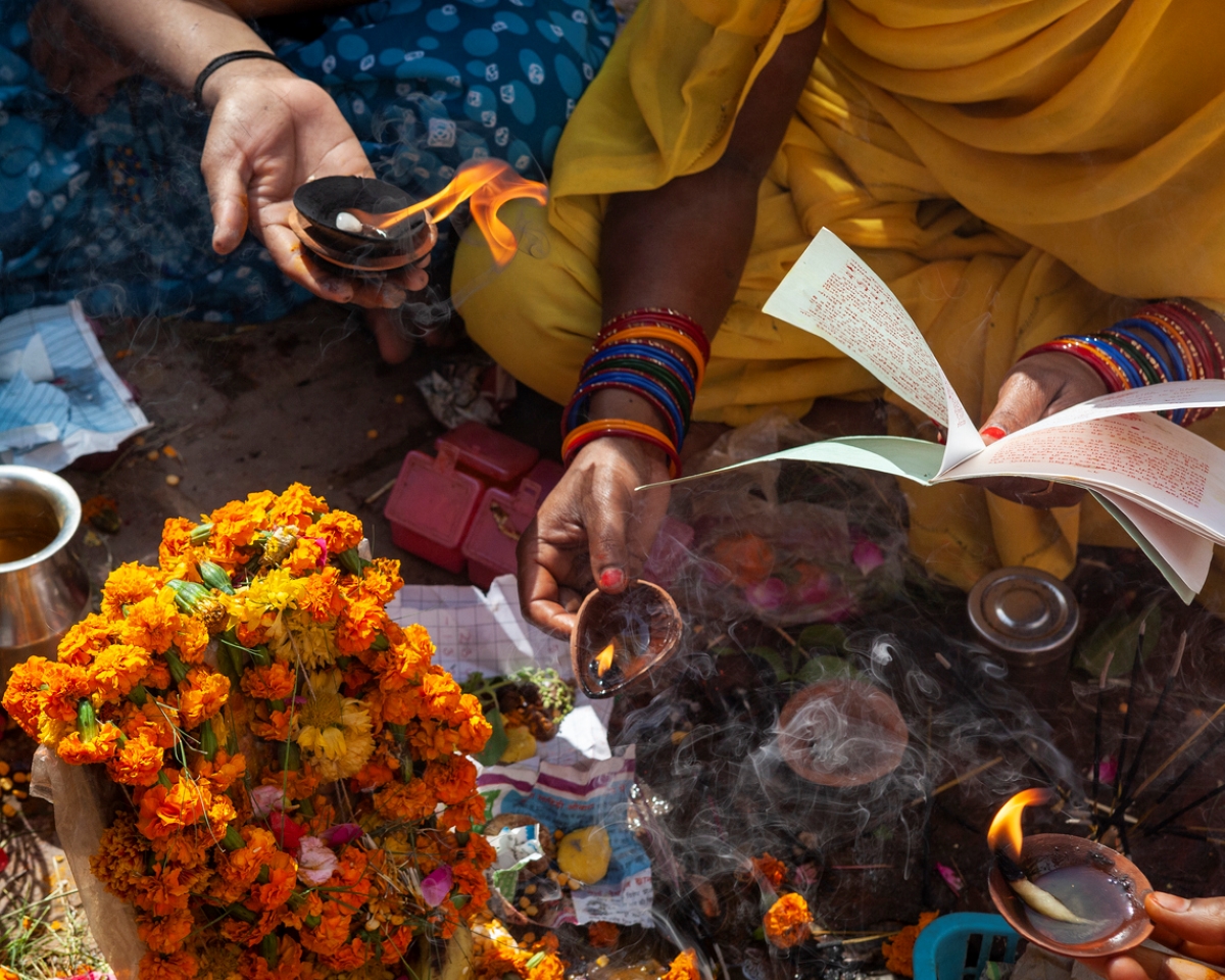 Women performing puja