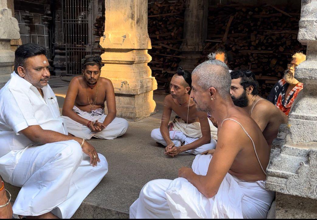 NCPCR member Dr RG Anand conducts an inquiry with the Deekshithars.