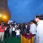 CM KCR light the golden coloured flame with a remote at the Telangana martyr's memorial inauguration