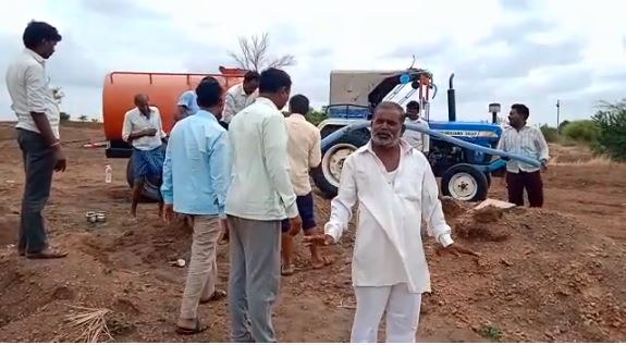 Villagers offering water to deadbodies at graveyards in Vijayapura