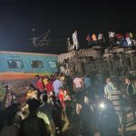 One of the coaches “was pushed into the ground " as another from a neighbouring train collapsed on top of it, passengers said. (Supplied)