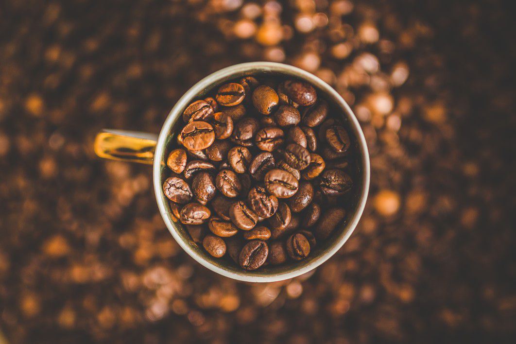 negative-space-coffee-cup-full-beans-Custom-2
