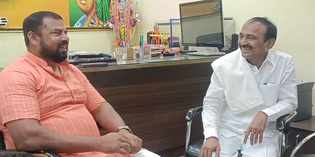 Raja Singh with Eatala Rajender.