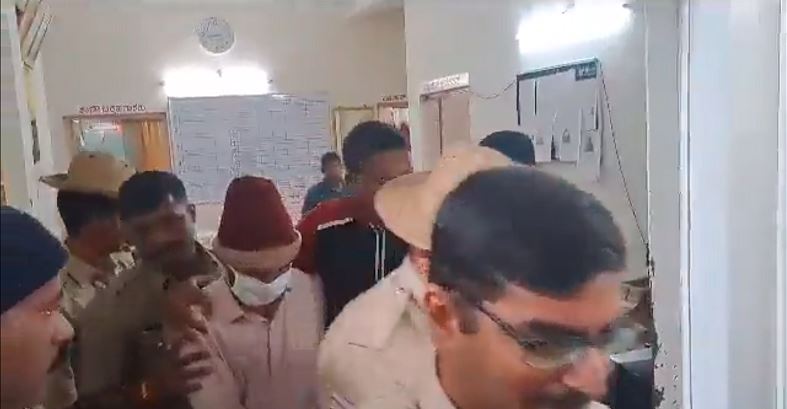 Video grab of Principal Francis Fernandez Being Arrested In Shivamogga