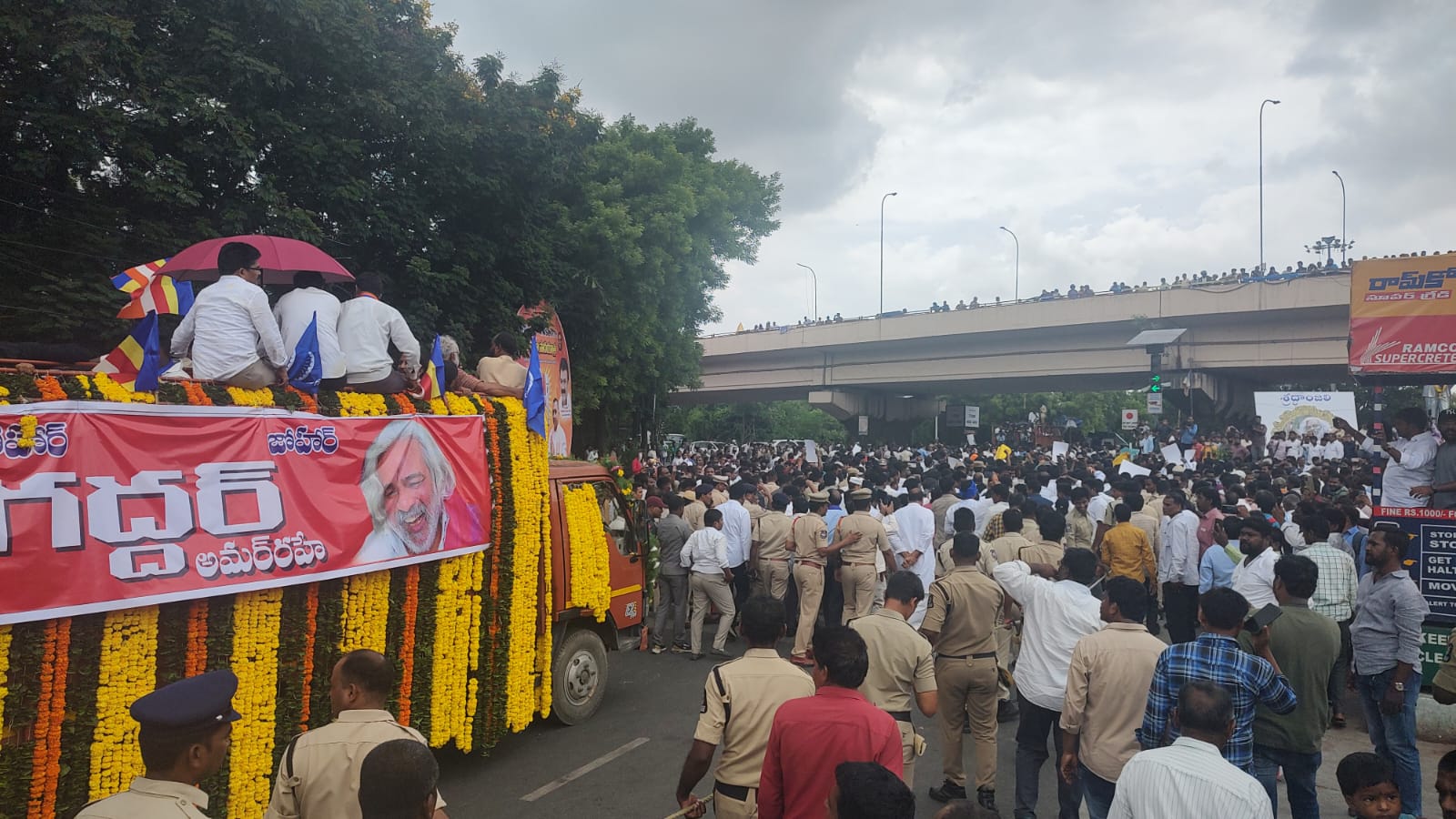 Gaddar laid to rest Hyderabad's streets filled with songs and tributes
