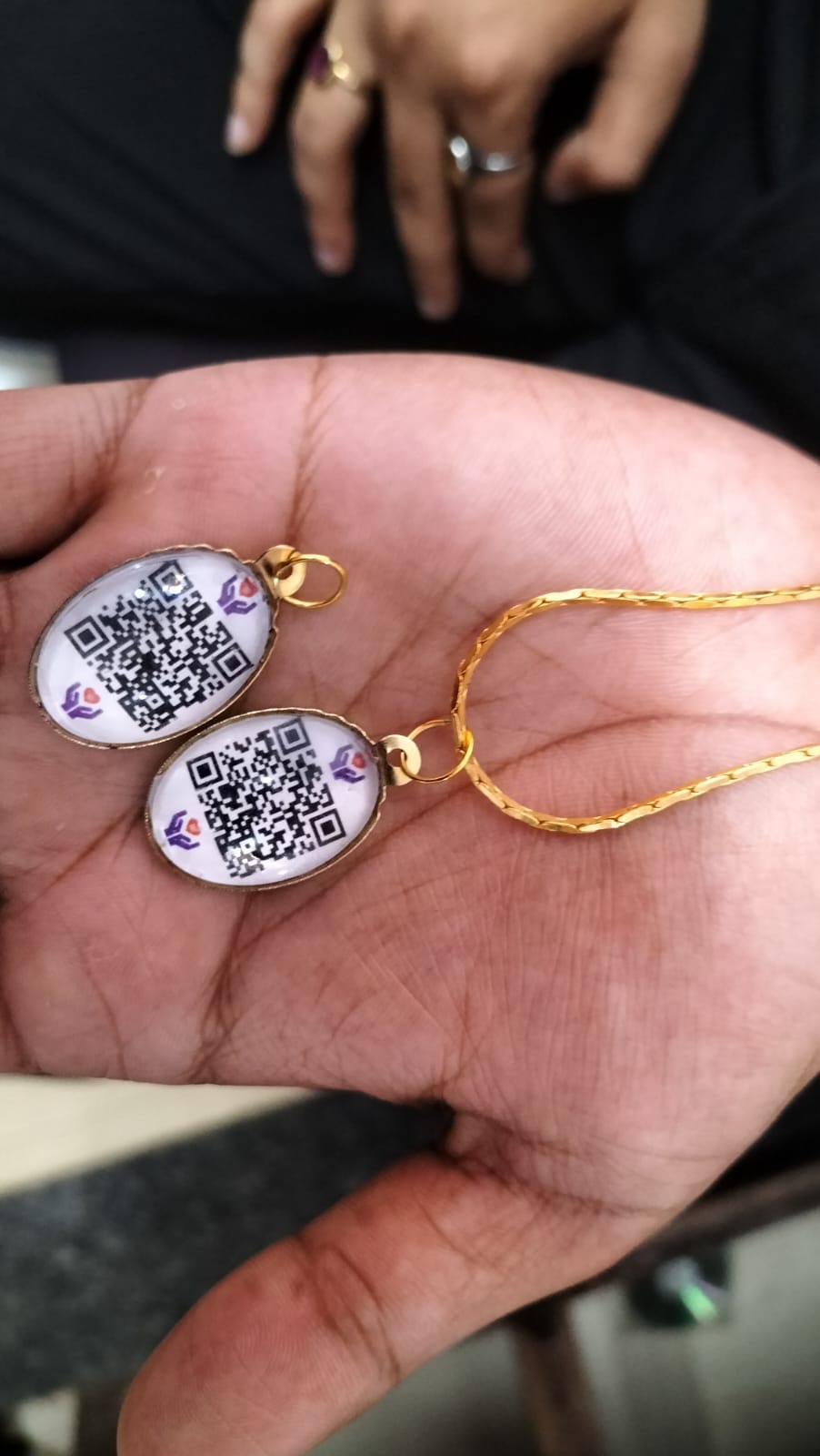 QR code pendants to trace your loved ones. (Supplied)