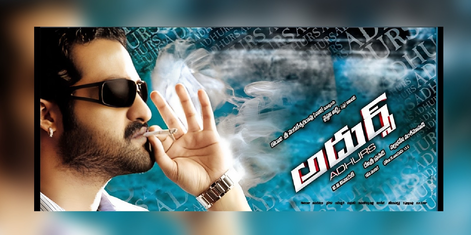 A poster of the film Adhurs