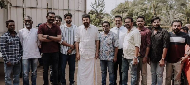 Mammootty poses with Vela film crew during the success meet
