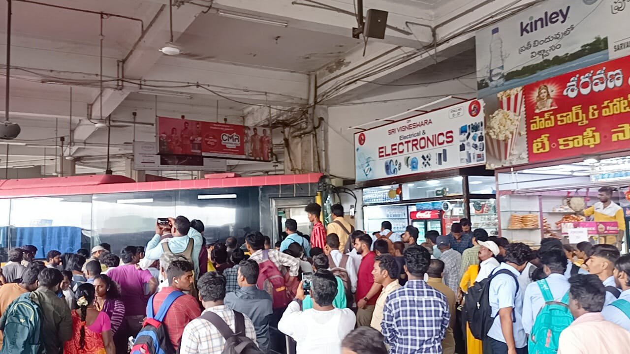 an RTC bus in Andhra Pradesh's Vijayawada overshoots the platform at the bus terminus.