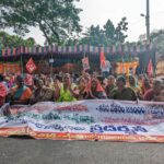 Cleaning section, women women workers chant for justice.