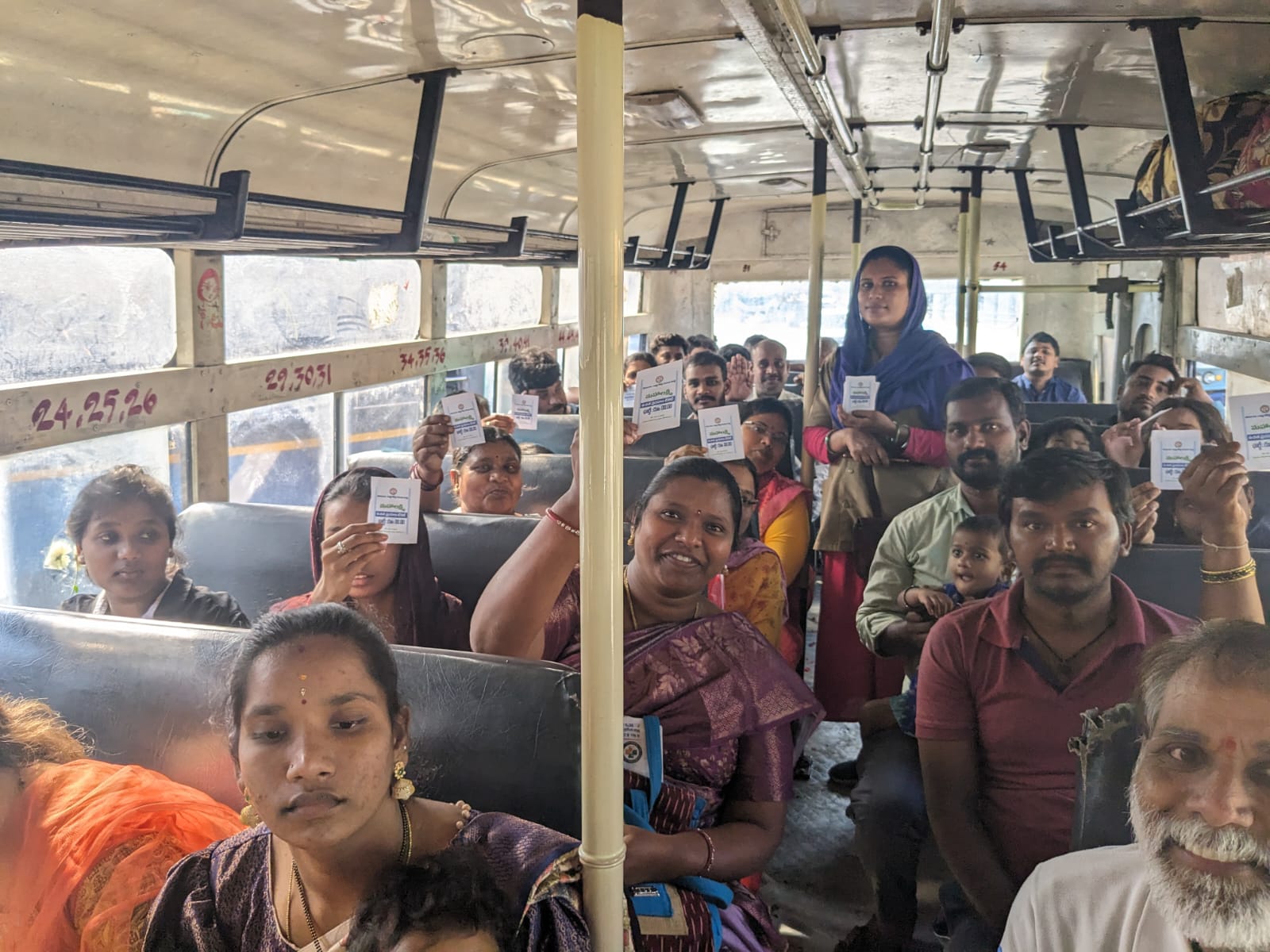 An ID card is mandatory for availing free travel on state-run non-luxury buses within Telangana. In picture, women riding the inaugural service. (Supplied)