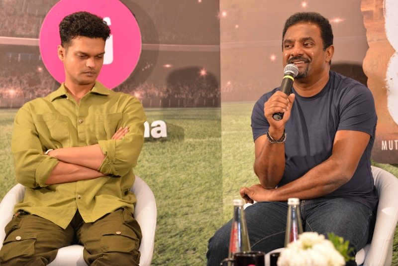 Muthiah Muralidaran with Madhur Mittal