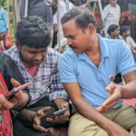 Electricity department worker Srinivas asks his colleague to share pictures of his challenging life with low wages.