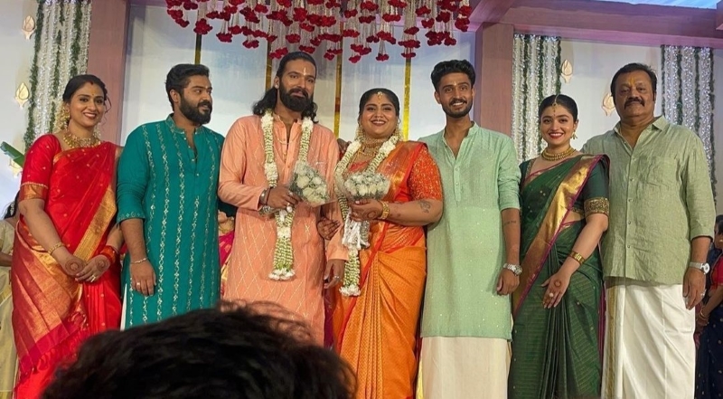 Bride and groom with their family members