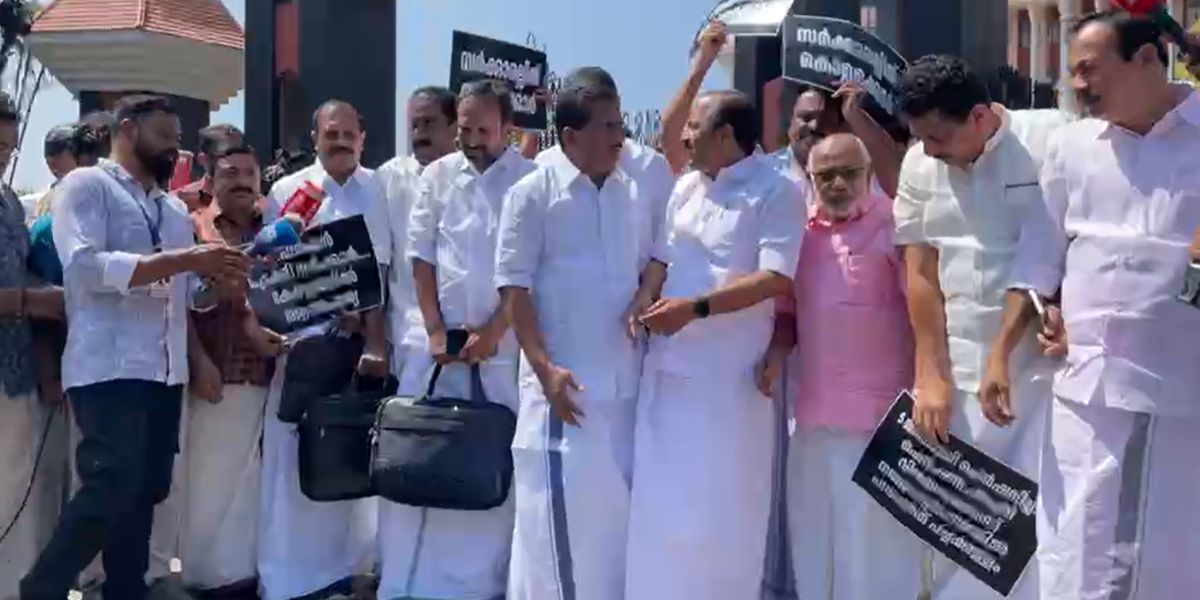 Opposition protesting after boycotting proceedings of the Kerala Assembly
