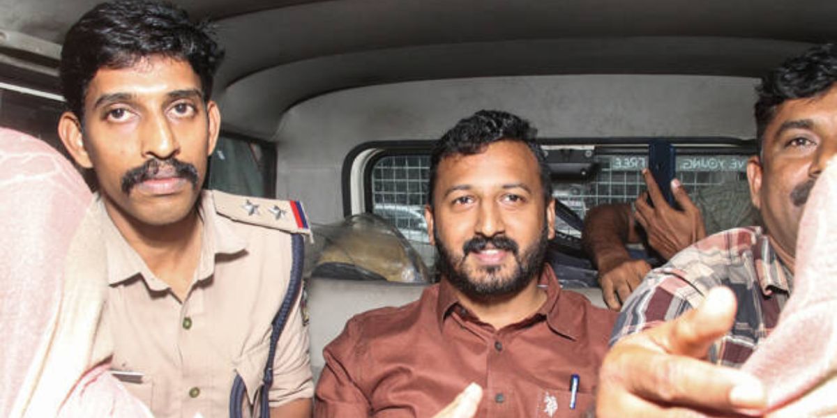 Rahul Mamkootathil in police custody. (Supplied)