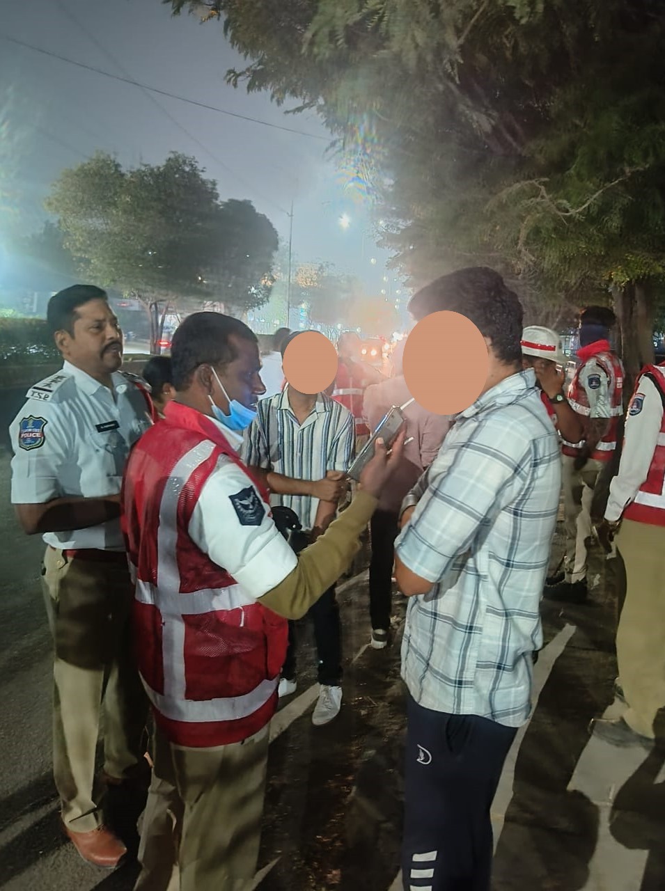 Telangana Police on duty checking the BAC levels of people (Supplied)