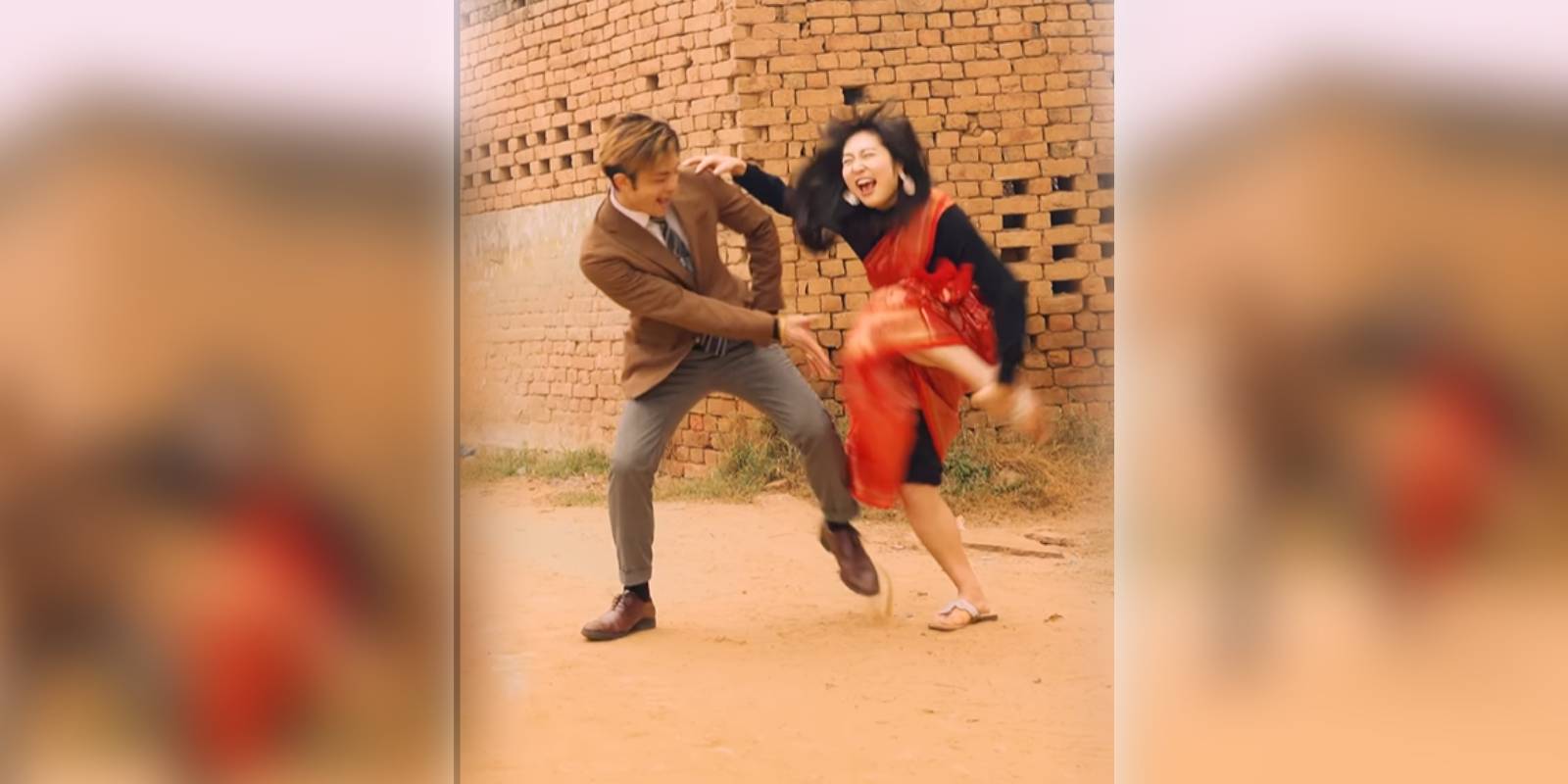 A couple from Japan dancing to the tune of Kurchi Madthapetti