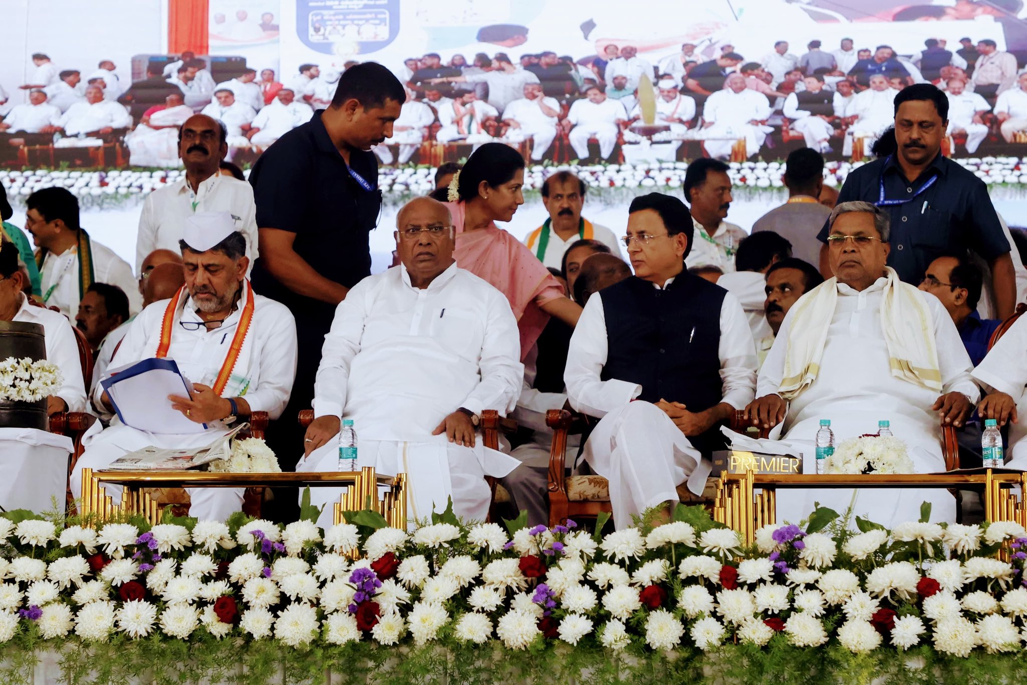 KPCC president and Deputy Chief Minister DK Shivakumar, AICC president Mallikarjun Kharge, AICC general secretary in-charge of Karnataka Randeep Surjewala and Chief Minister Siddaramaiah at the party workers' convention in Mangaluru on Saturday. (X)