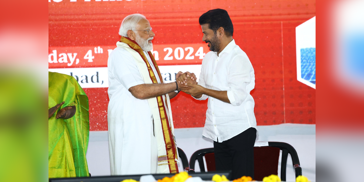 Prime Minister Modi and Telangana CM Revanth Reddy in Adilabad. (X)