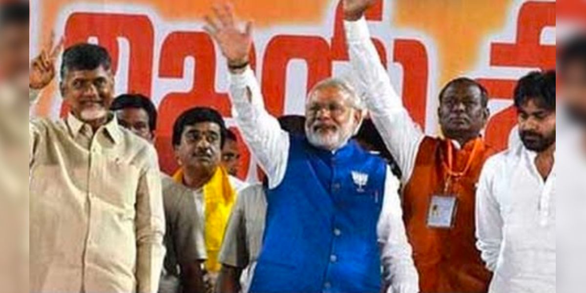 A snap from the video of PM Modi, former CM Chandra babu and JSP chief Pawan Kalyan campaigning in 2014. (Supplied)
