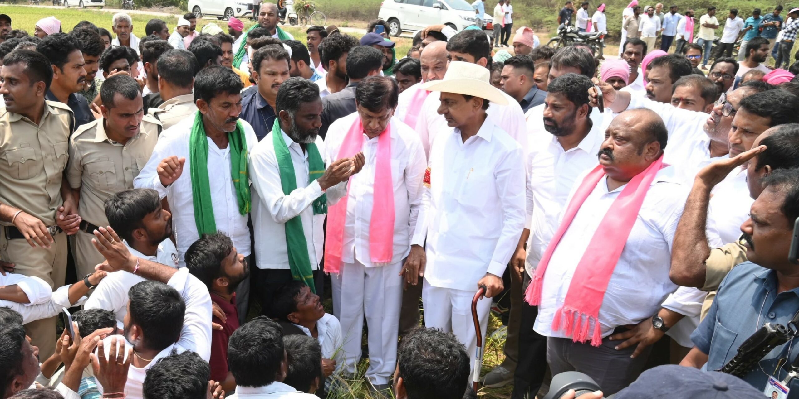 BRS chief K Chandrashekar Rao interacts with farmers on Friday, 5 April, 2024.