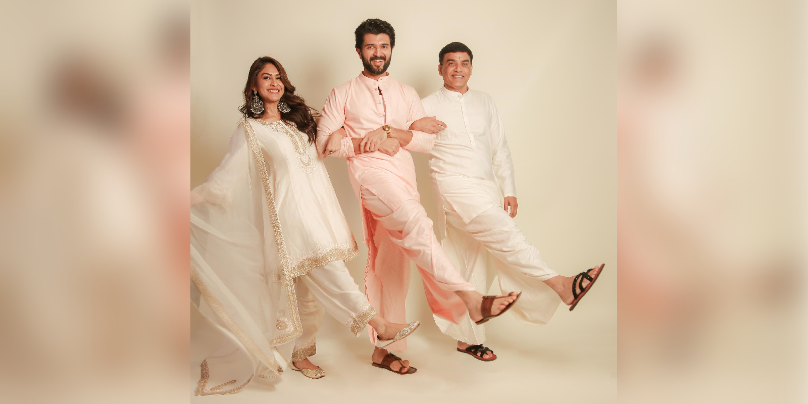 Mrunal Thakur, Vijay Deverakonda, and producer Dil Raju strike a pose