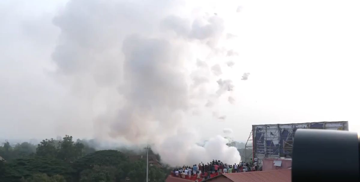 People witnessing the Thrissur Pooram fireworks in daylight