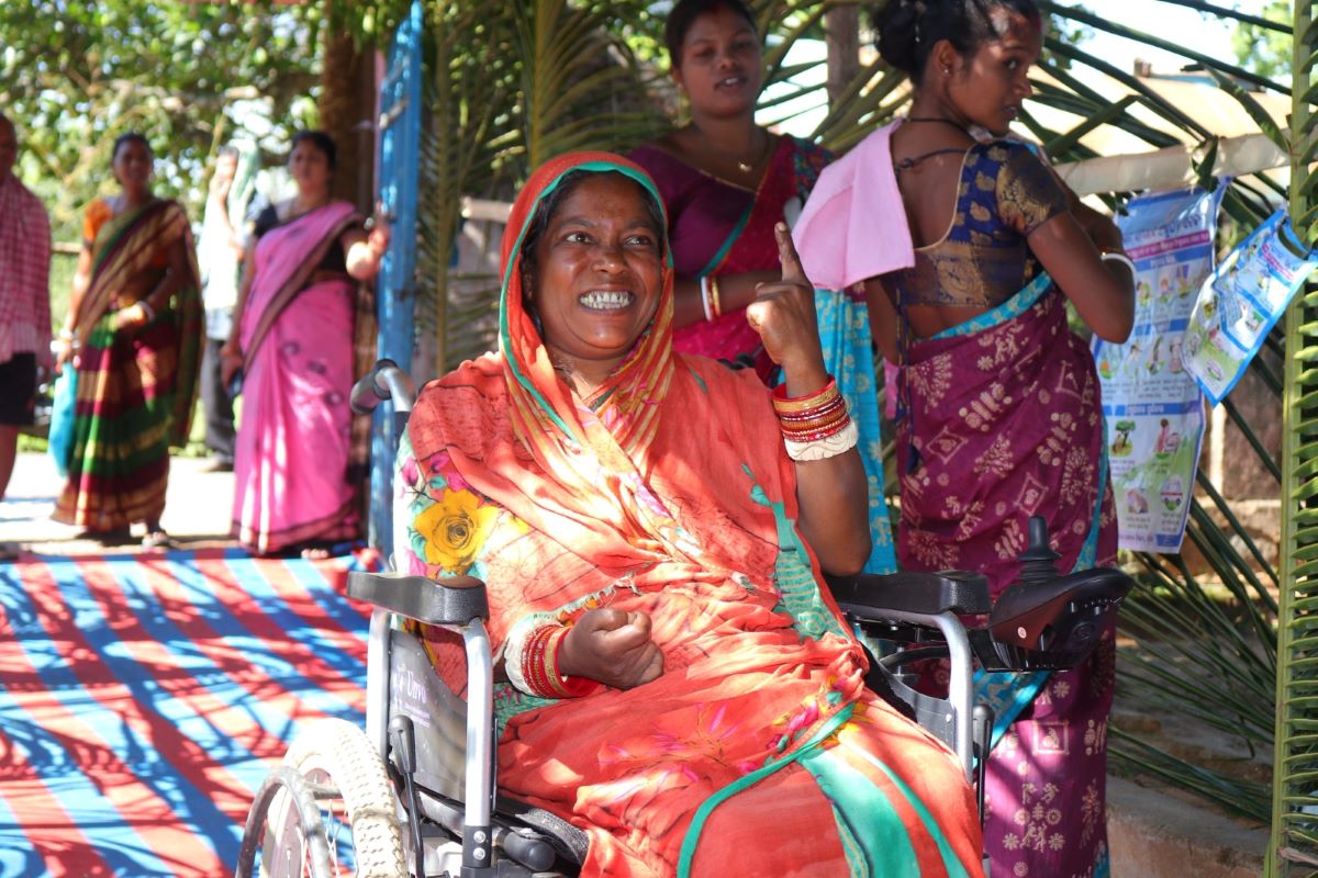A vote flaunting her inked finger