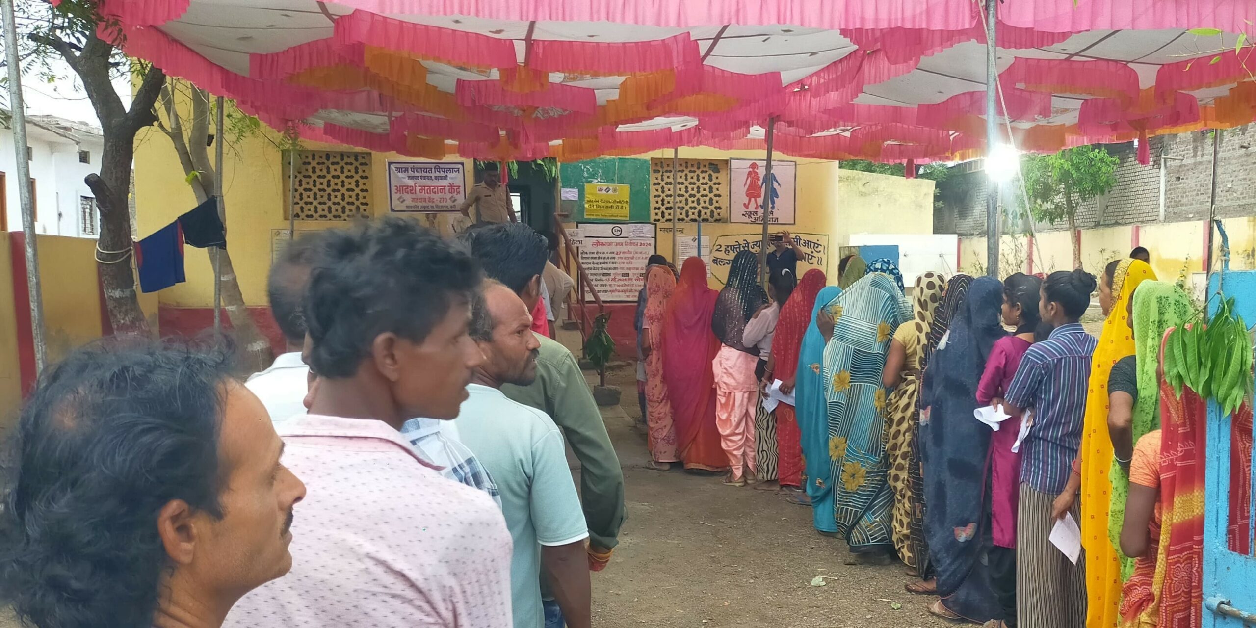 Voters at a polling booth.