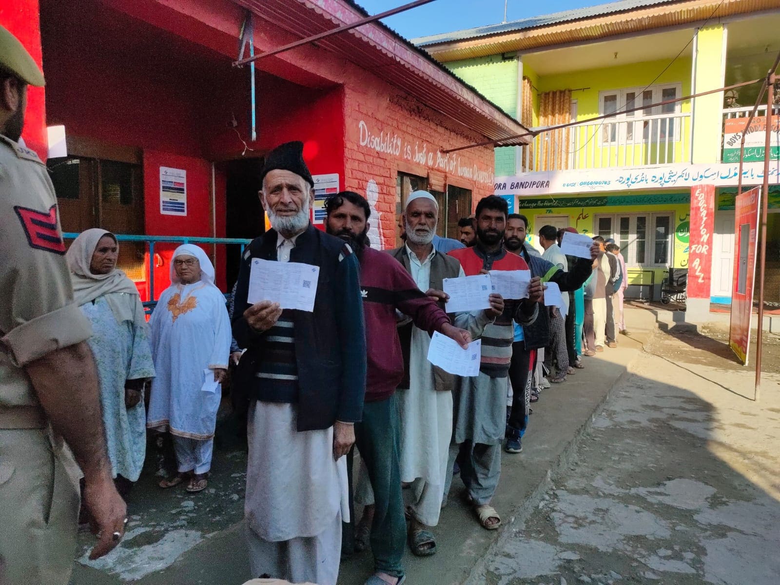 Voters wait their at a polling station in Lankreshipora, Bandipora, in Jammu and Kashmir. (CEO J&K/X)