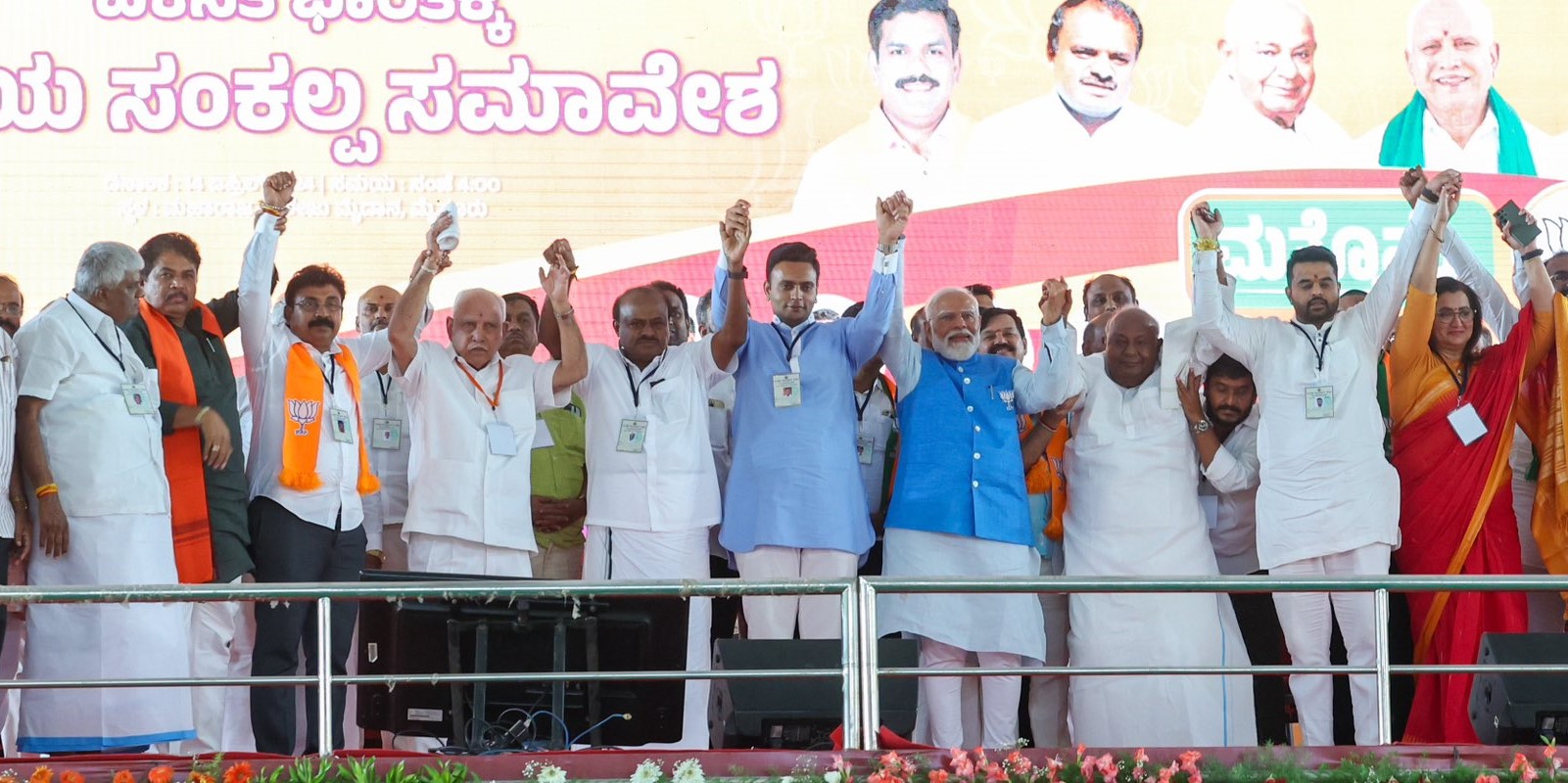 Prajwal Revanna and HD Deve Gowda with Prime Minister Narendra Modi and leaders of BJP and JD(S) on 14 April, 2024. (X)