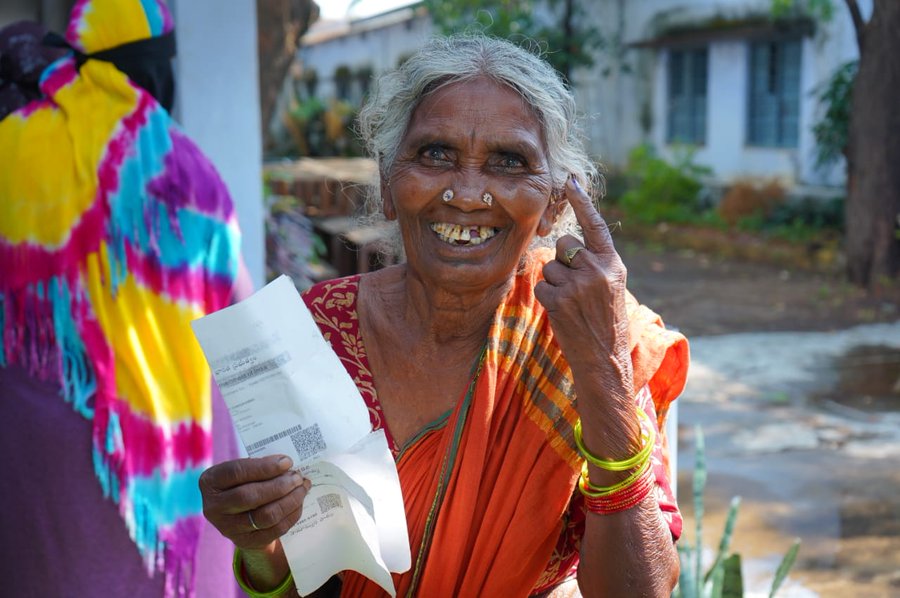 An elderly woman is all smiles after casting her vote in Warangal. (PIB Telangana/X)