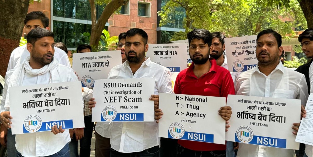 NSUI members protests against NEET results.