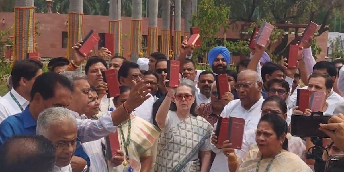 Opposition MPs with copies of the Constitution.