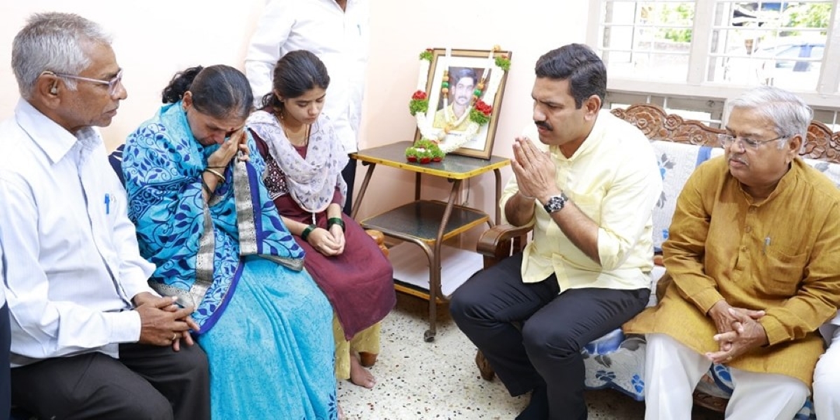 Vijayendra with the family of Renukaswamy. (Facebook)