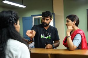 Naveen John explains a scene to Satna Titus